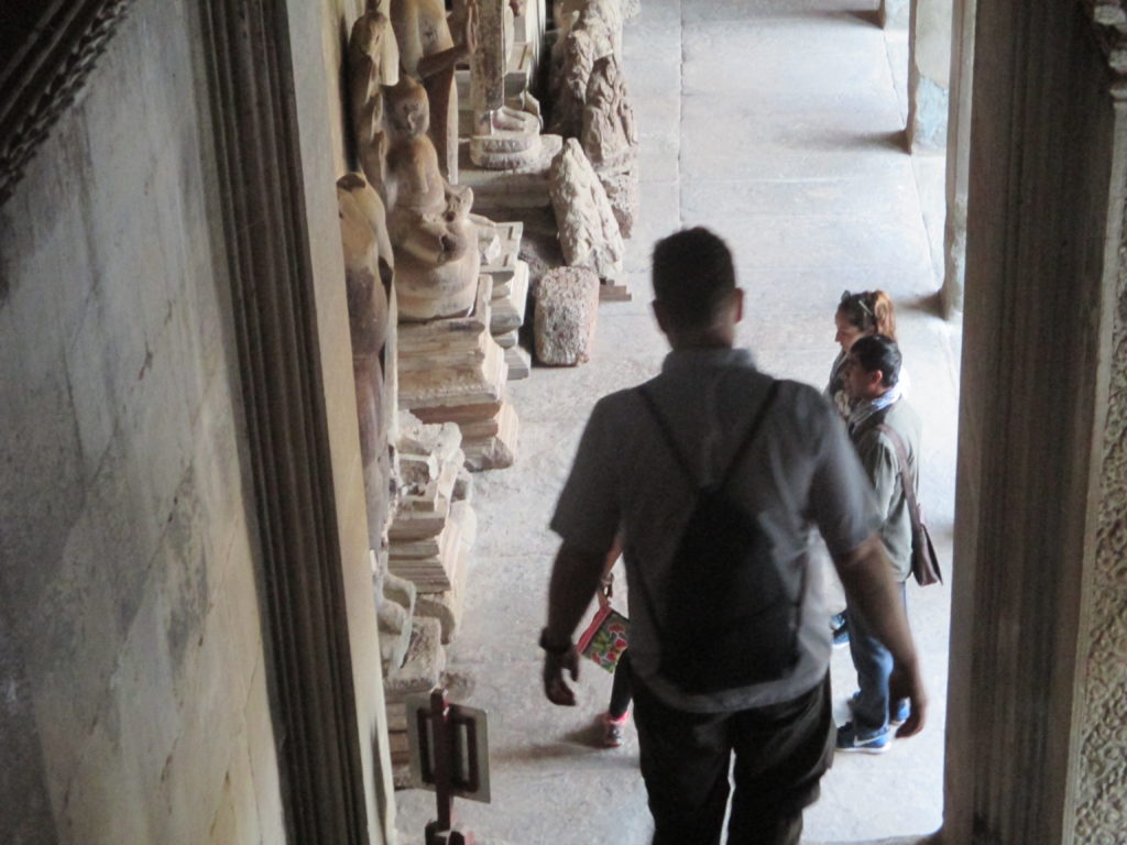 Ray entering the "1000 Buddha Gallery" where they placed all of the recovered statues after the Khmer Rouge destroyed them